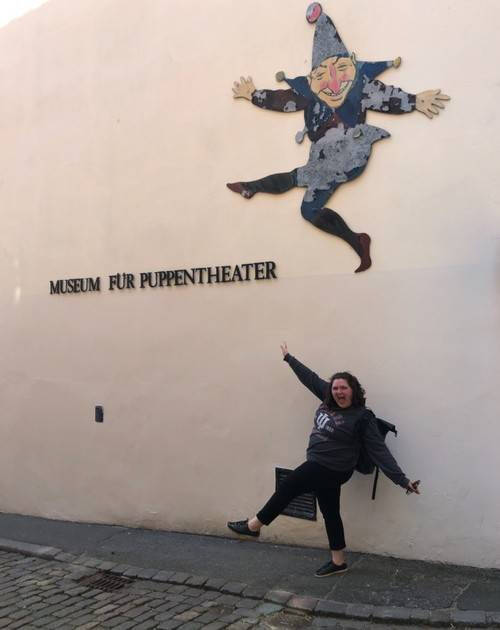 Alumna Stephanie Tanis posing in front of a Museum